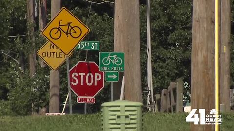 Shawnee examining intersection after car strikes boy riding bike