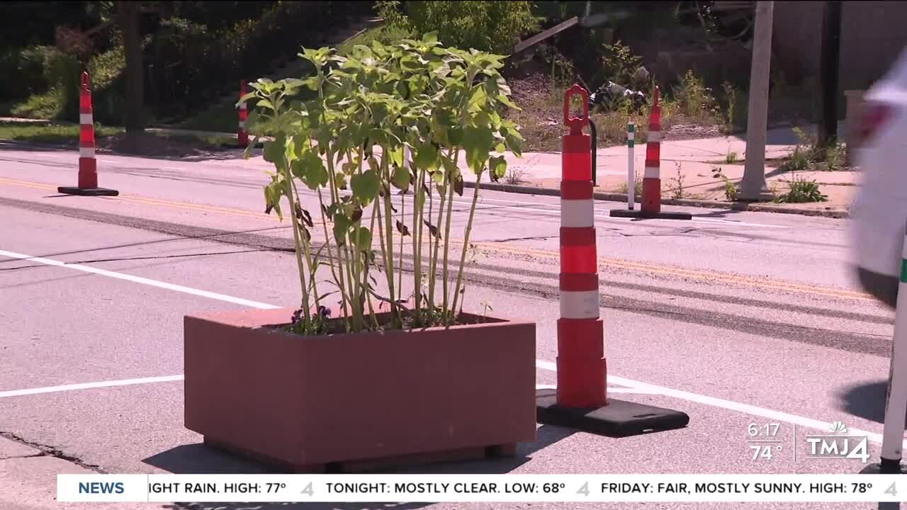 New layer of protection added to freshly painted bike lanes on Milwaukee's North Avenue