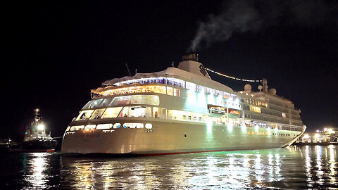 Tugboat Assisting a Cruise Ship’s Smooth Departure from a Mediterranean Port