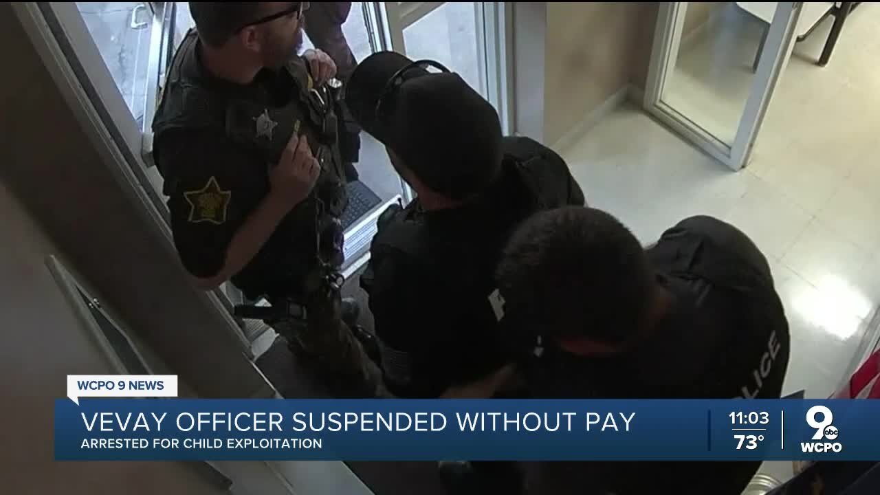 Police officer suspended without pay after arrest for child exploitation