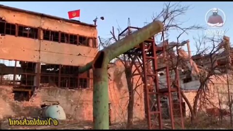 A Red Banner waves from the heights of Azovstal while the Soviet Anthem blasts in the old speakers of the steel factory