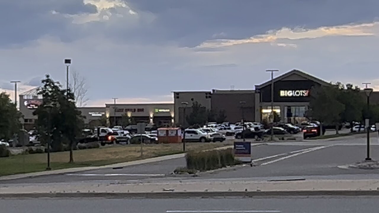 Gang? Takes over parking lot weekly border of Aurora