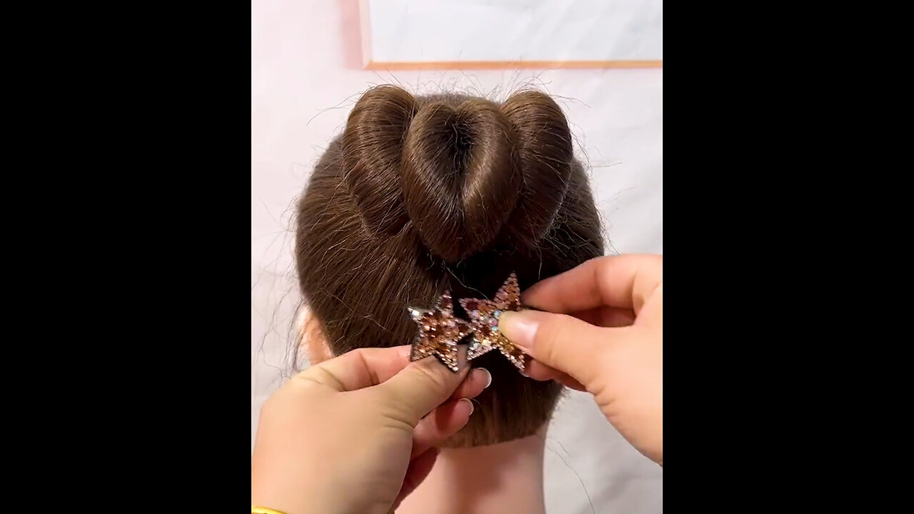 "Feeling like a hair icon with this creative do! 💇♀️✨"