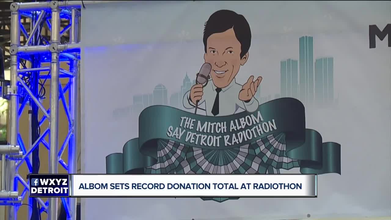 Albom sets record donation total at radiothon