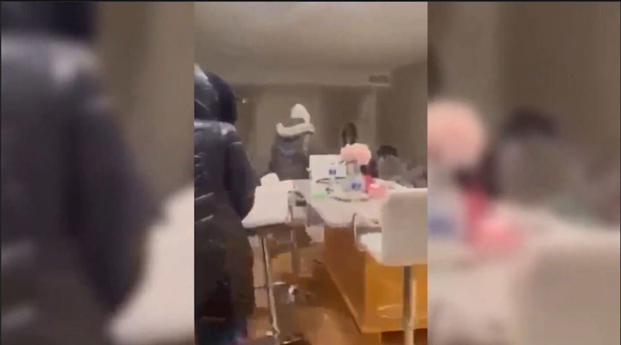 Shocking video recorded in Minneapolis forcing their way inside an apartment to beat two women