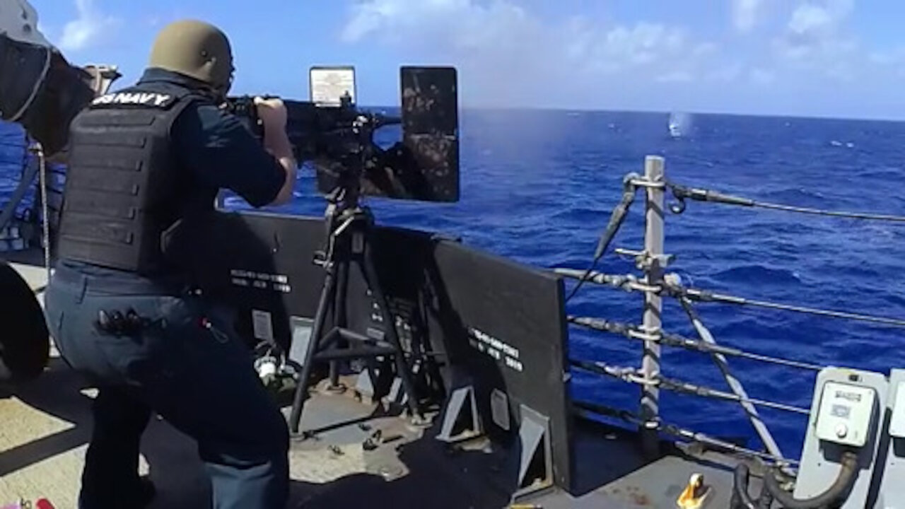 USS John S. McCain conducts live-fire exercise