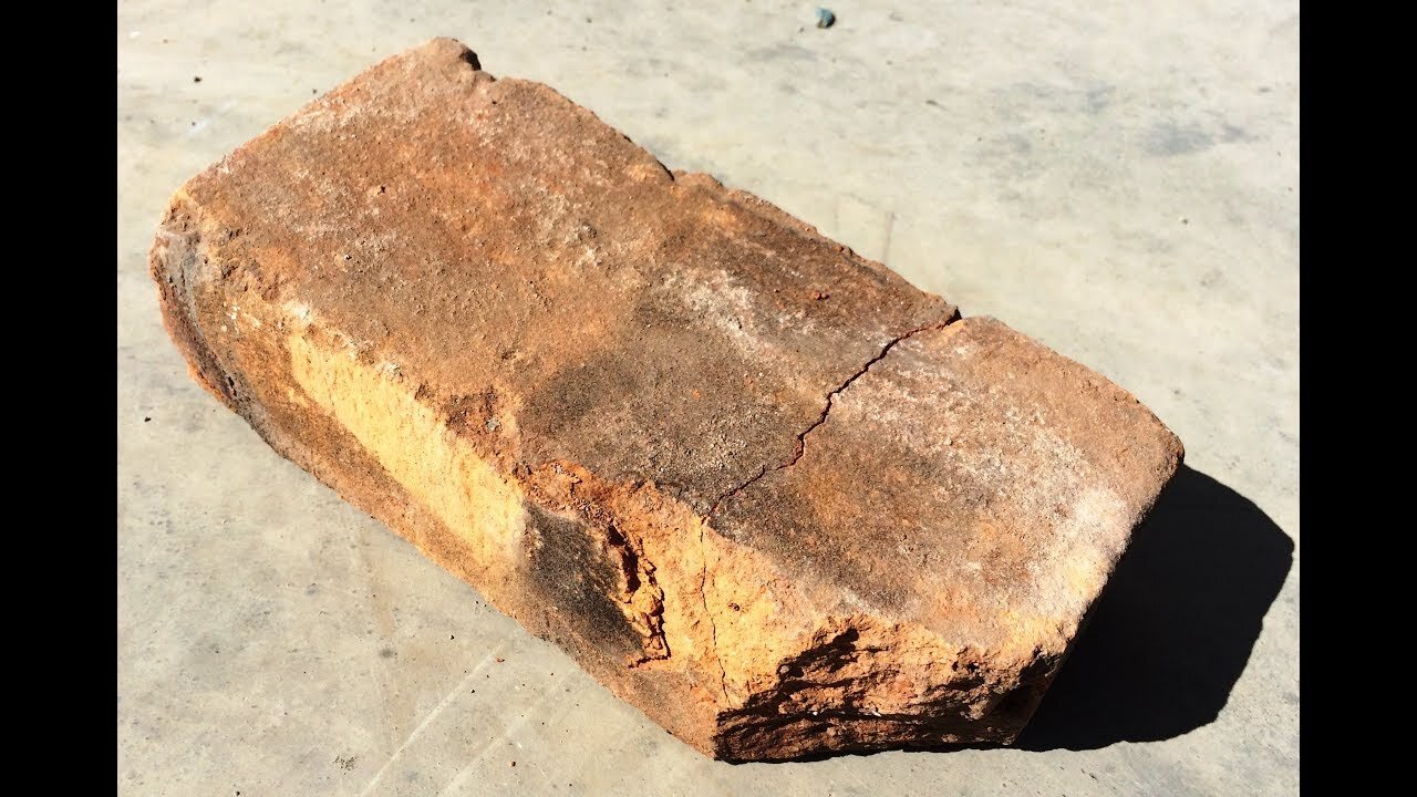 Man Accidentally Drops A Brick While Building A Wine Cellar And Finds A Mystery Inside