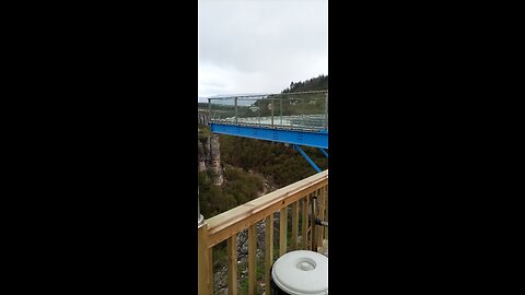 The glass walkway over the abyssal canyon