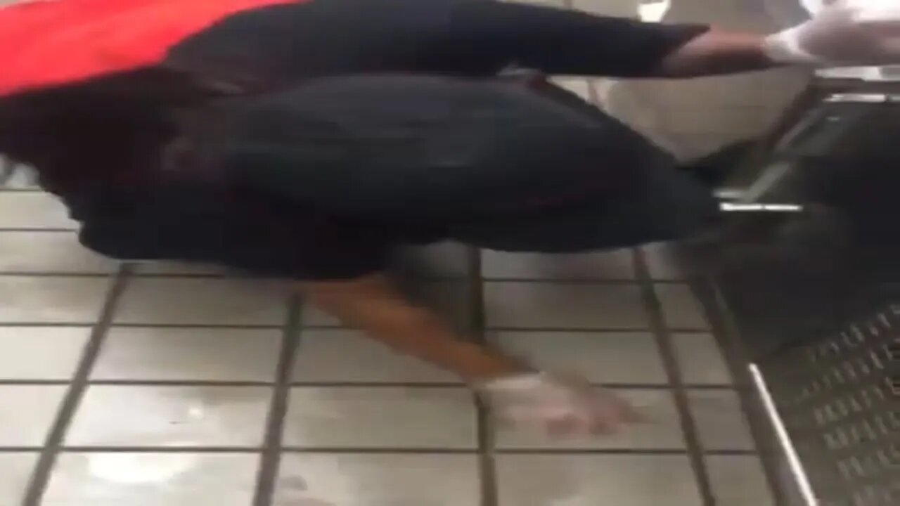 Fast food Checker employee rubs the burger patty on the floor right before serving the customer