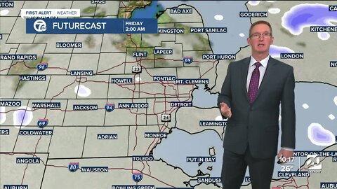 Passing snow showers tonight