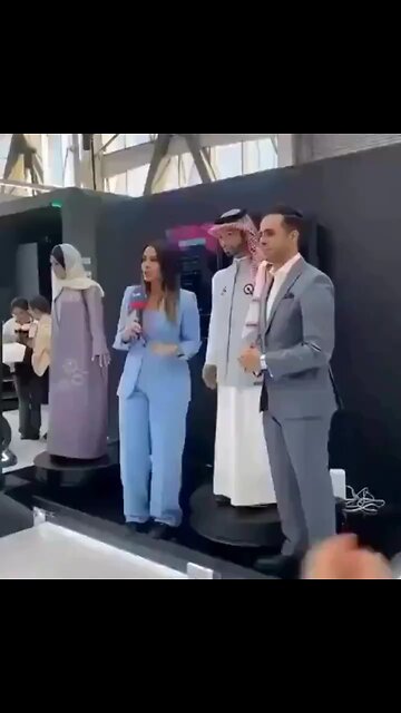 Saudi Arabia's first male robot appears to inappropriately touch a female reporter