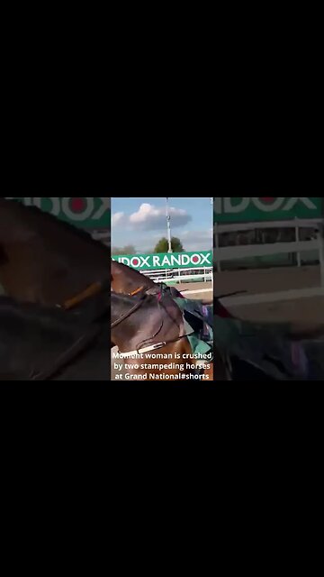 Moment woman is crushed by two stampeding horses at Grand National #shorts