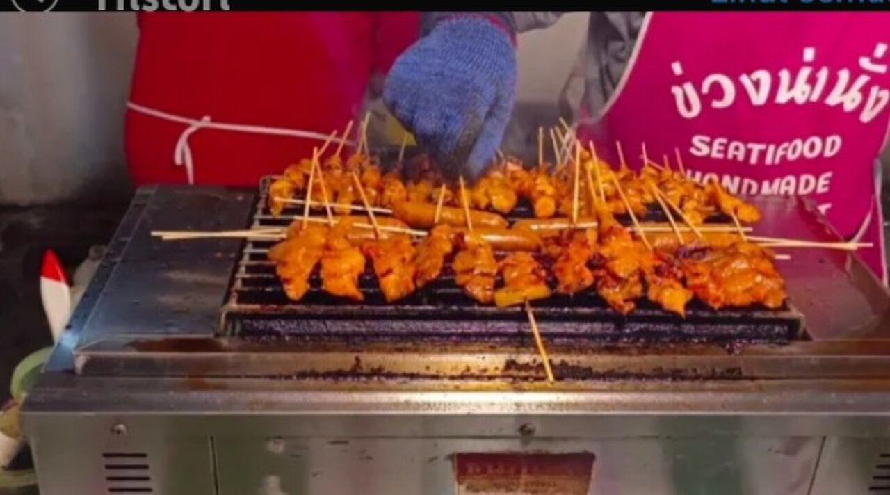 Grilled Stick​ Pork Intestines in Chiang Mai Walking Street, Thailand Street Food, ( 4K HD )