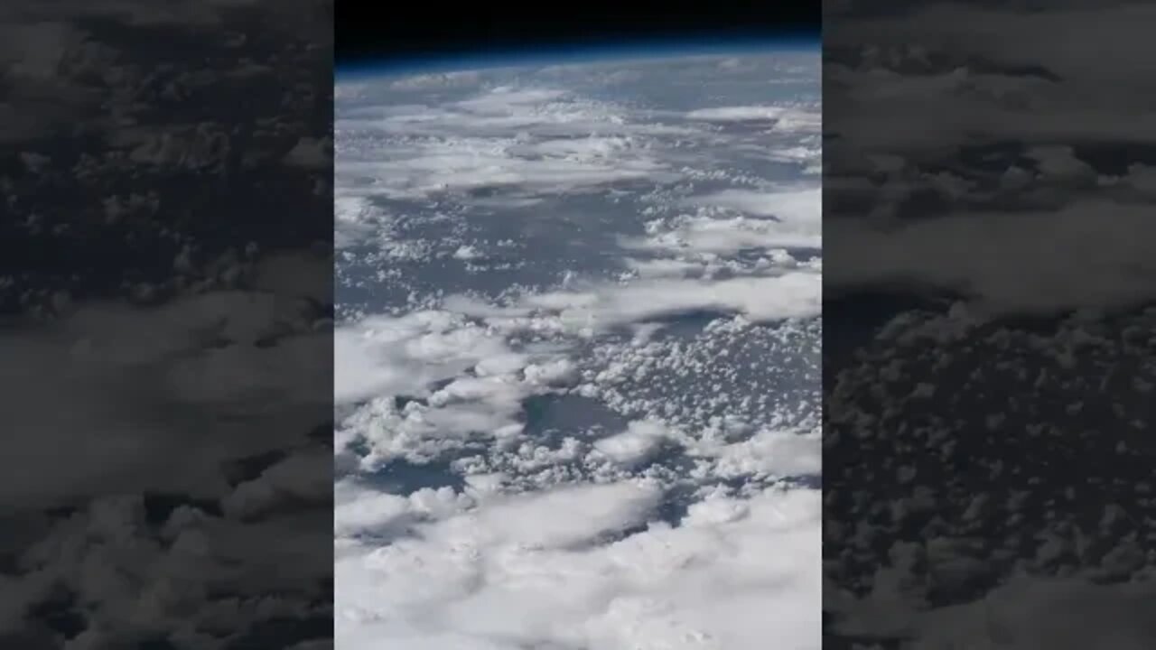 Earth from The Orbit With Clouds