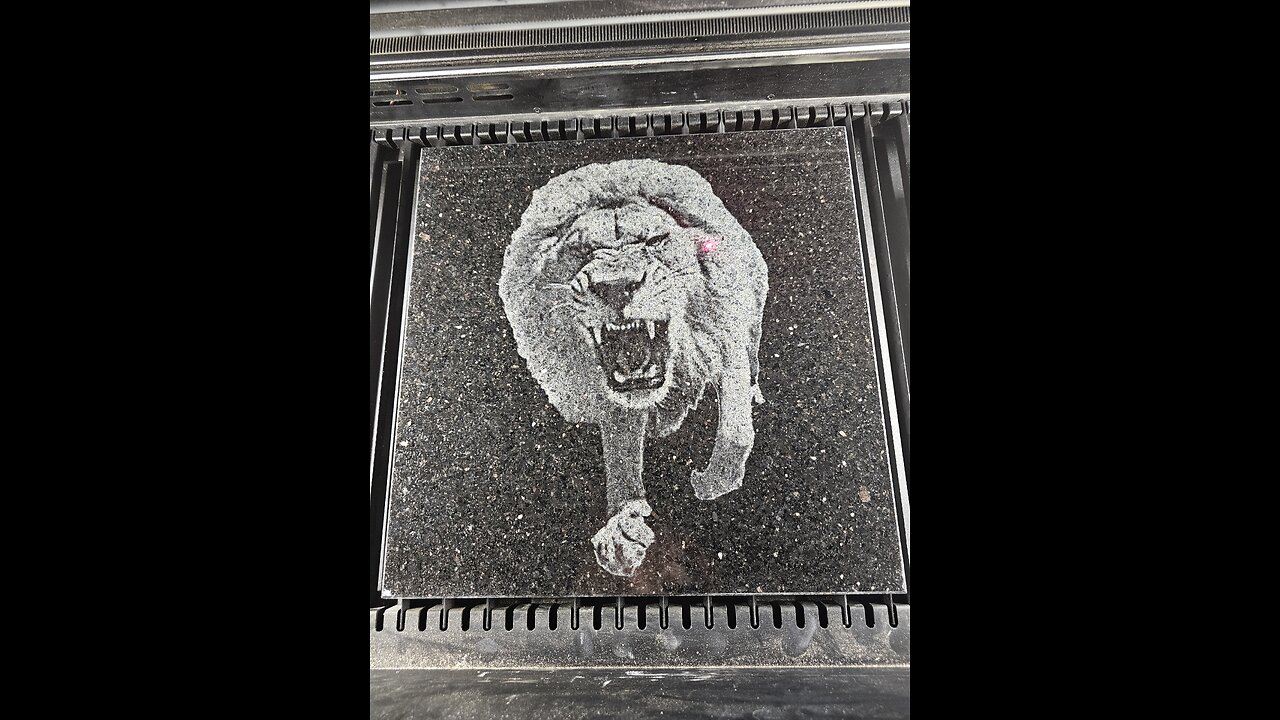 CO2 Laser Engraving Charging Lion onto Granite Monument