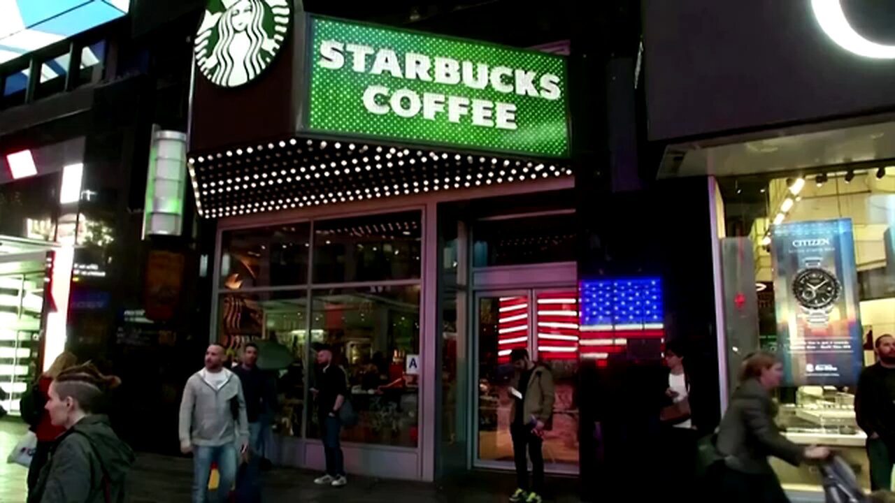 Starbucks workers strike in key cities at height of holiday season