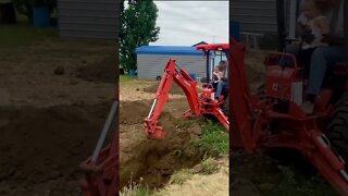 MOVING Dirt: Teaching them young how to play in the dirt with the big toys!