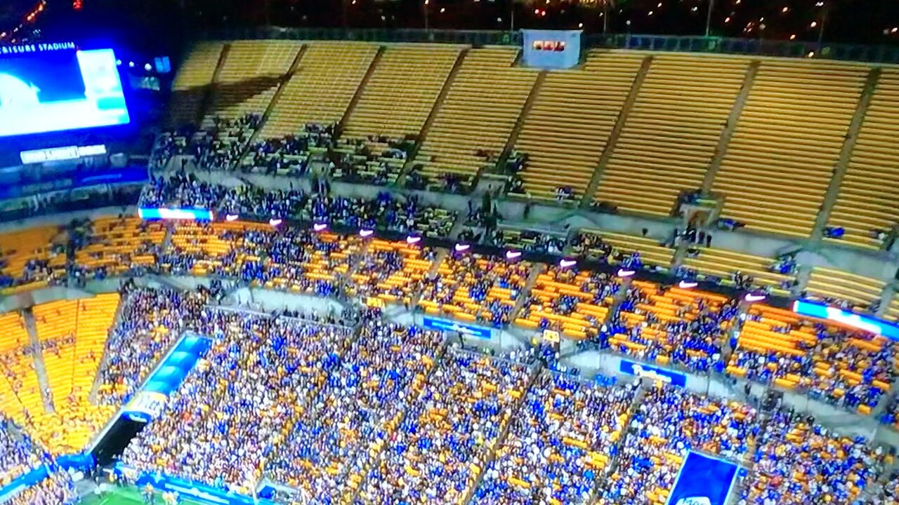 POV from a parachute team landing in Pitt’s Home-field Acrisure Stadium