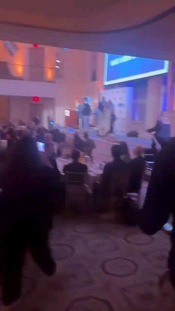 Protestors rush stage at Mayor Eric Adams speech. New York is official tired of his failed policies.