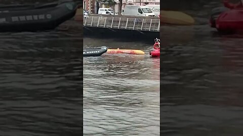 kayak capsules in river Liffey