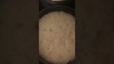 Making sure the rice cooked and boiled