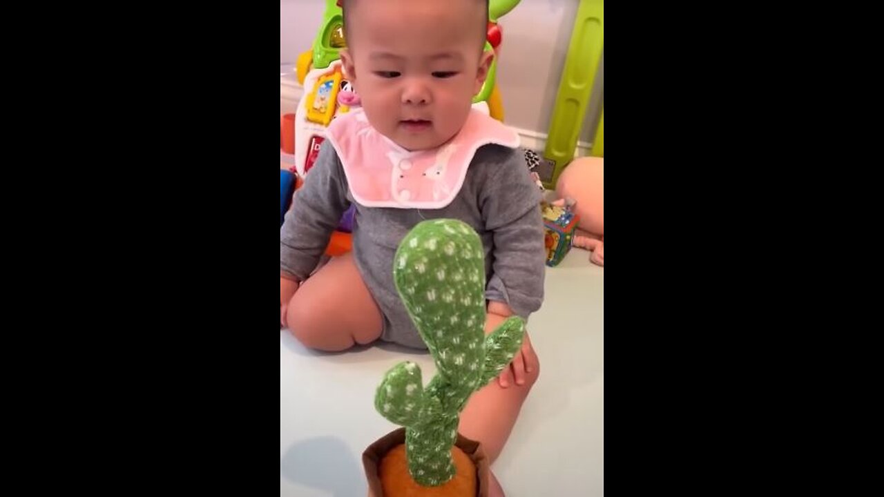 Babies play dancing cactus toy. Cutest baby funniest moments.