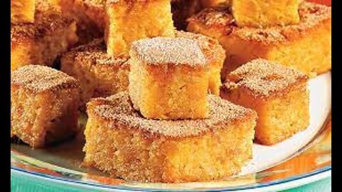 75-Bolo de batata doce com creme de leite, ovo, manteiga, coco ralado, leite condensado.