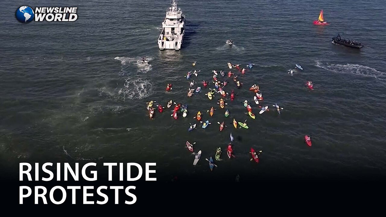 Dozens arrested as climate protesters block world's largest coal port