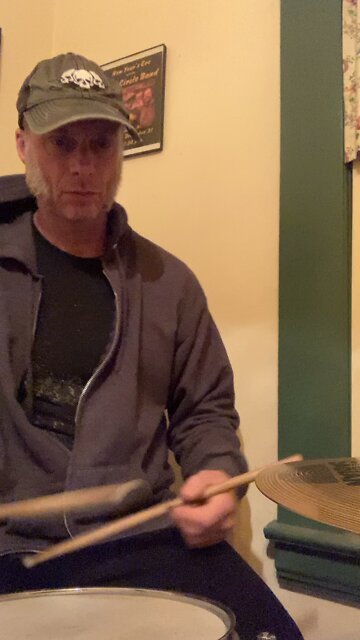 I suck at playing the drums and that’s the entire point