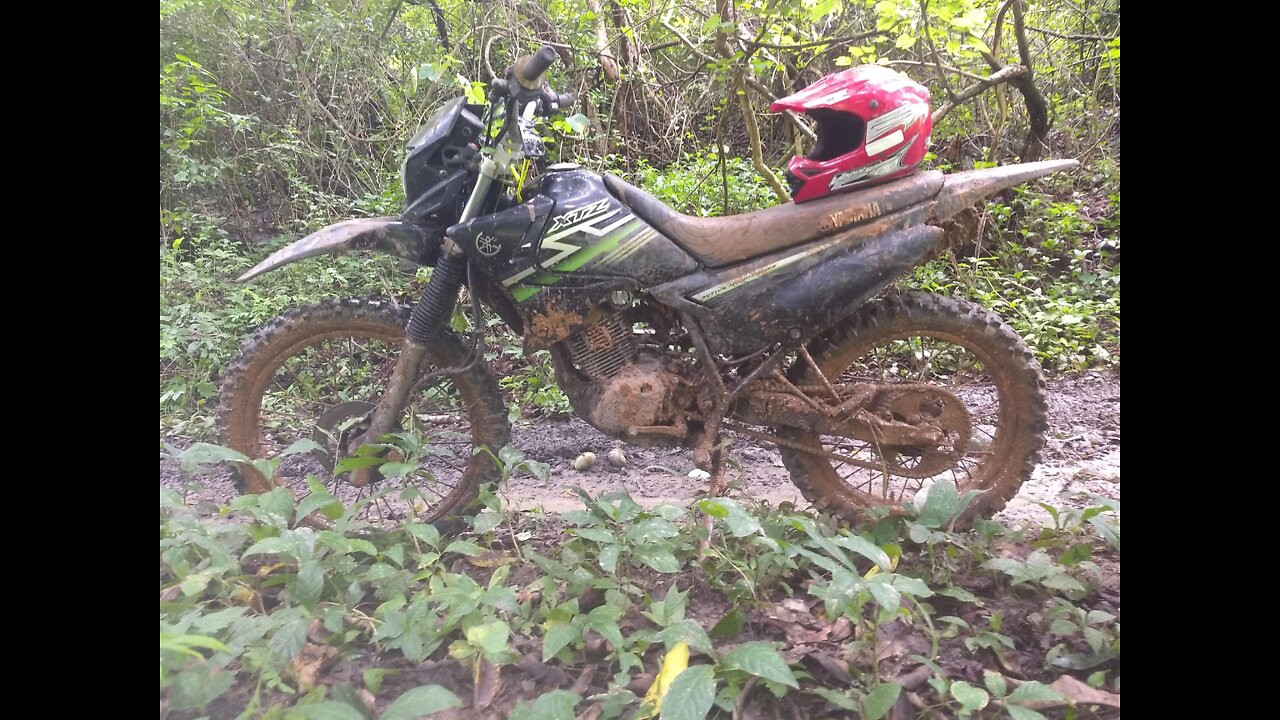 crossing waterfall by motorcycle