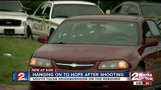 Neighborhood hangs on to hope after shooting