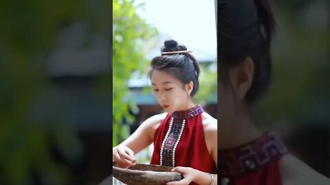 Chinese girl eating kathal