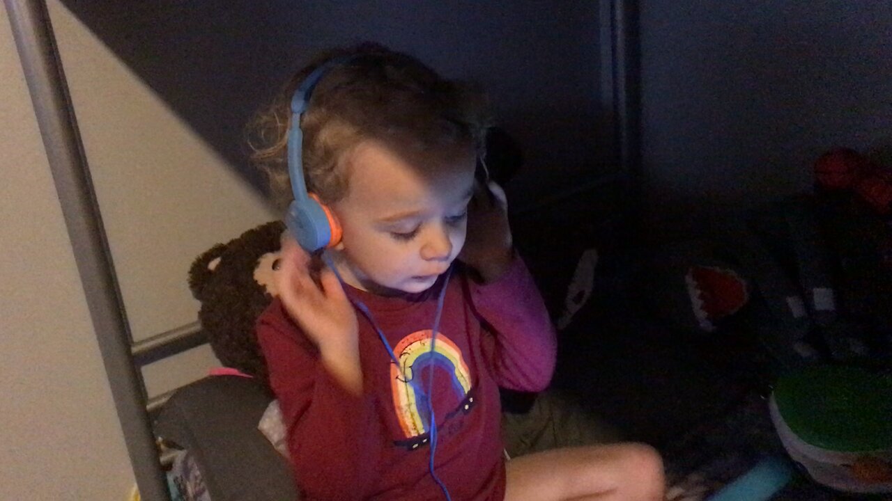 Handsome boy trying his new headphones