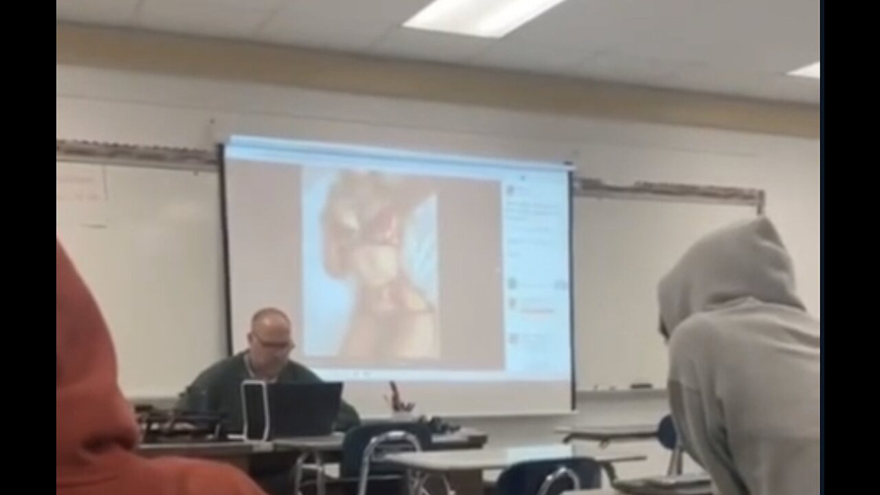 School Teacher Looks At Bikinis In Class