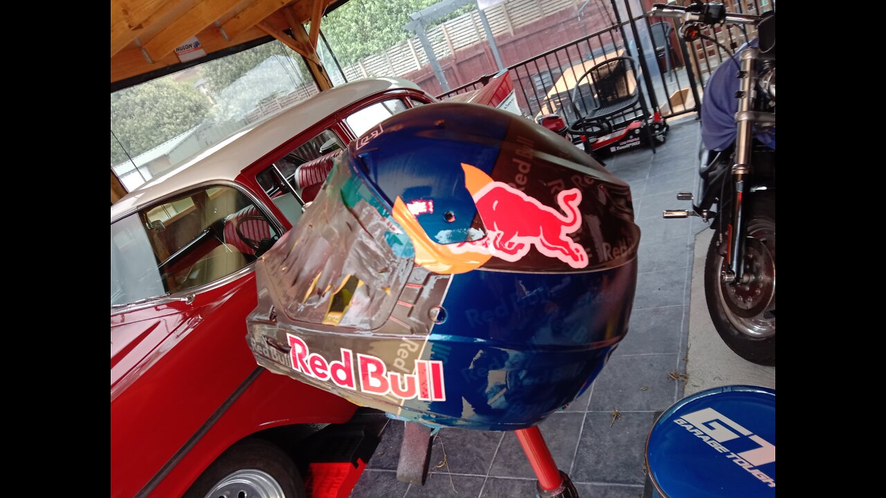 Custom painted red Bull helmet