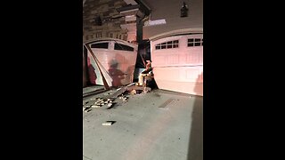 Girl across the street crashed car into two houses