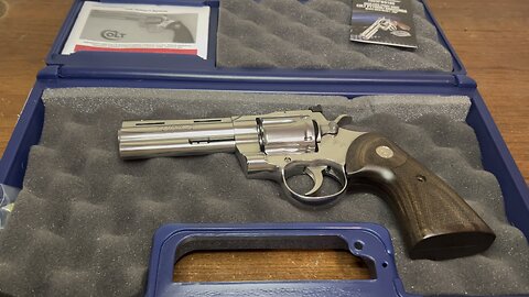 202 Colt Python . Wilson Combat sights.