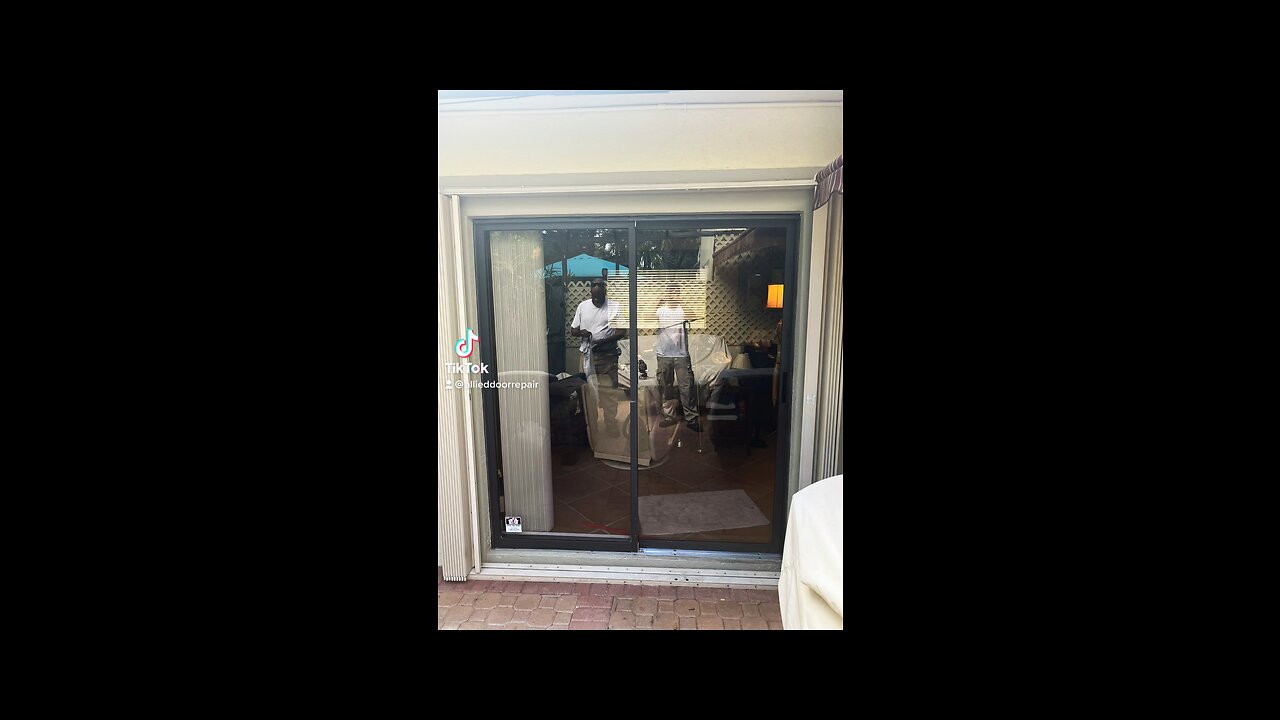 Sliding glass door repair; roller replacement and track refurbishing, in Coral Springs, Fl.