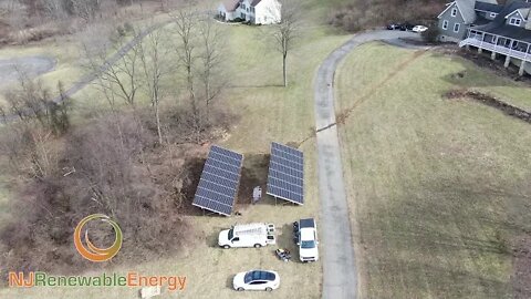 Aerial views of solar ground mounts and city solar