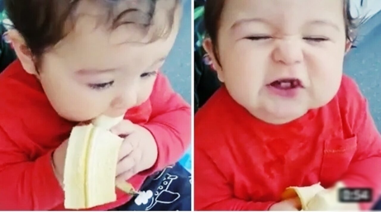 Cutest baby boy ever chows down on tasty banana