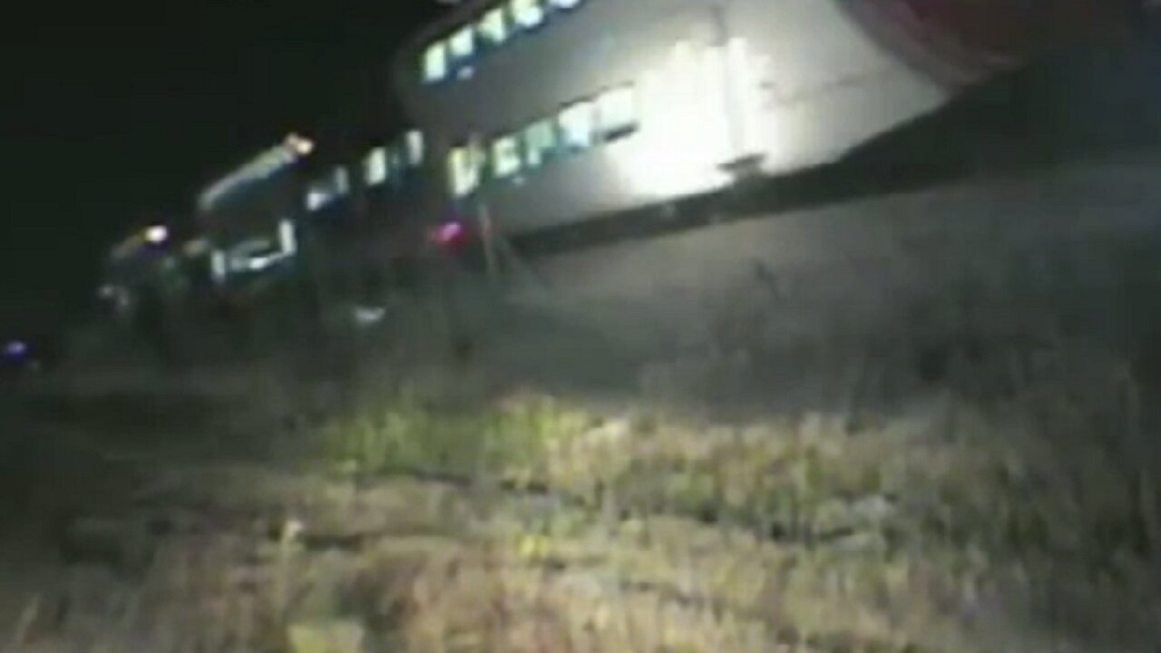 Trooper pulls driver from vehicle seconds before train hits