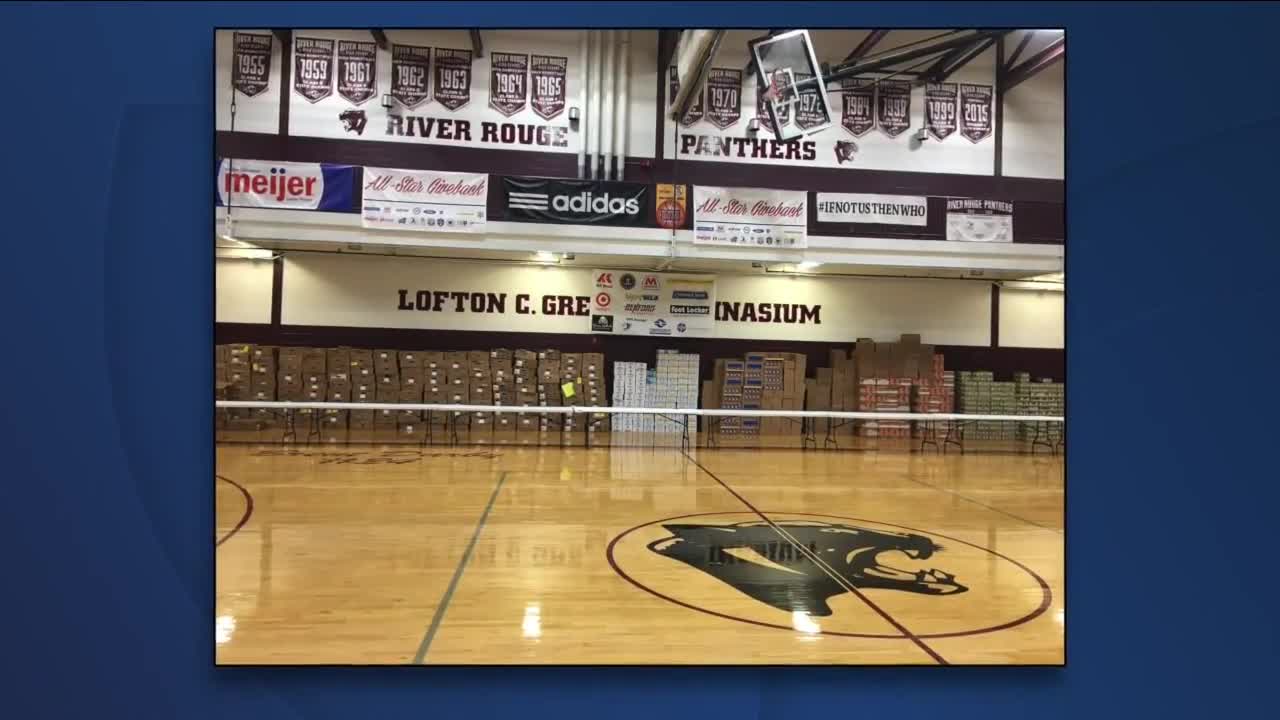 Annual celebrity turkey giveaway at River Rouge High School