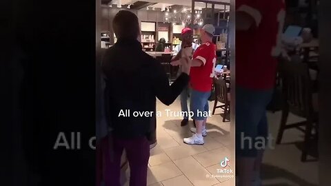 ALL OVER A TRUMP HAT IN STARBUCKS