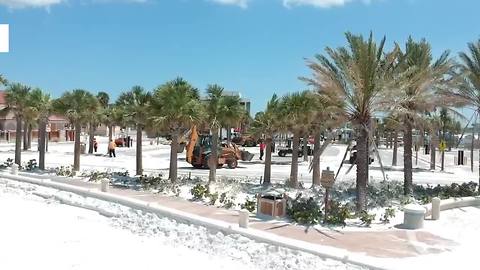 Drone shows sand being removed from Clearwater parking lot