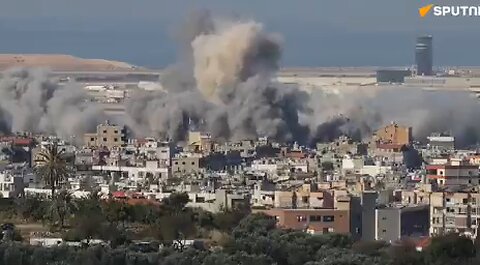 The moment a building near Beirut airport was hit during the attack this morning