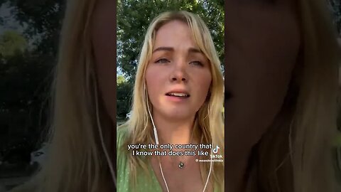 AUSTRALIAN GIRL TRIGGERED BY THE AMERICAN FLAG