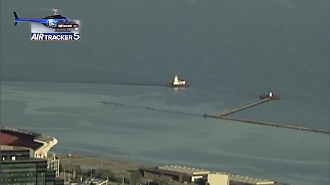 AirTracker 5 over rising waters near the breakwall