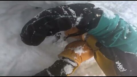 Snowboarder Buried Head Down in Snow Rescued by Skier cs 2