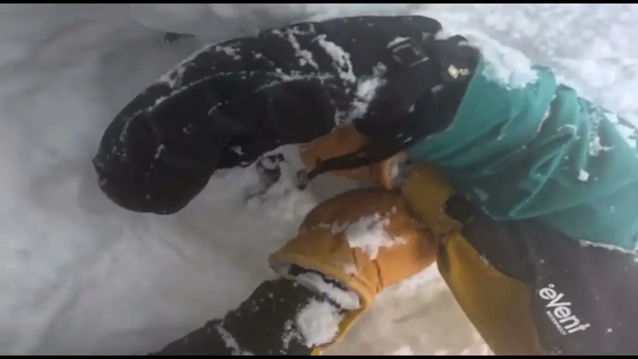Snowboarder Buried Head Down in Snow Rescued by Skier cs 2