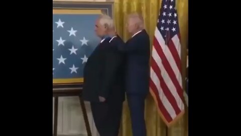 Biden puts medal on backwards